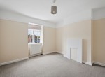 Bedroom-with-fireplace-small-window